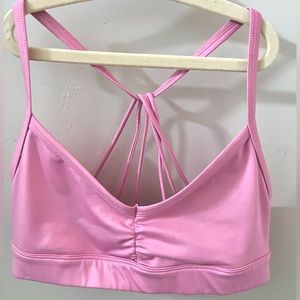 New ALO yoga sunny strappy athletic bra; beautiful soft pink color; size xs